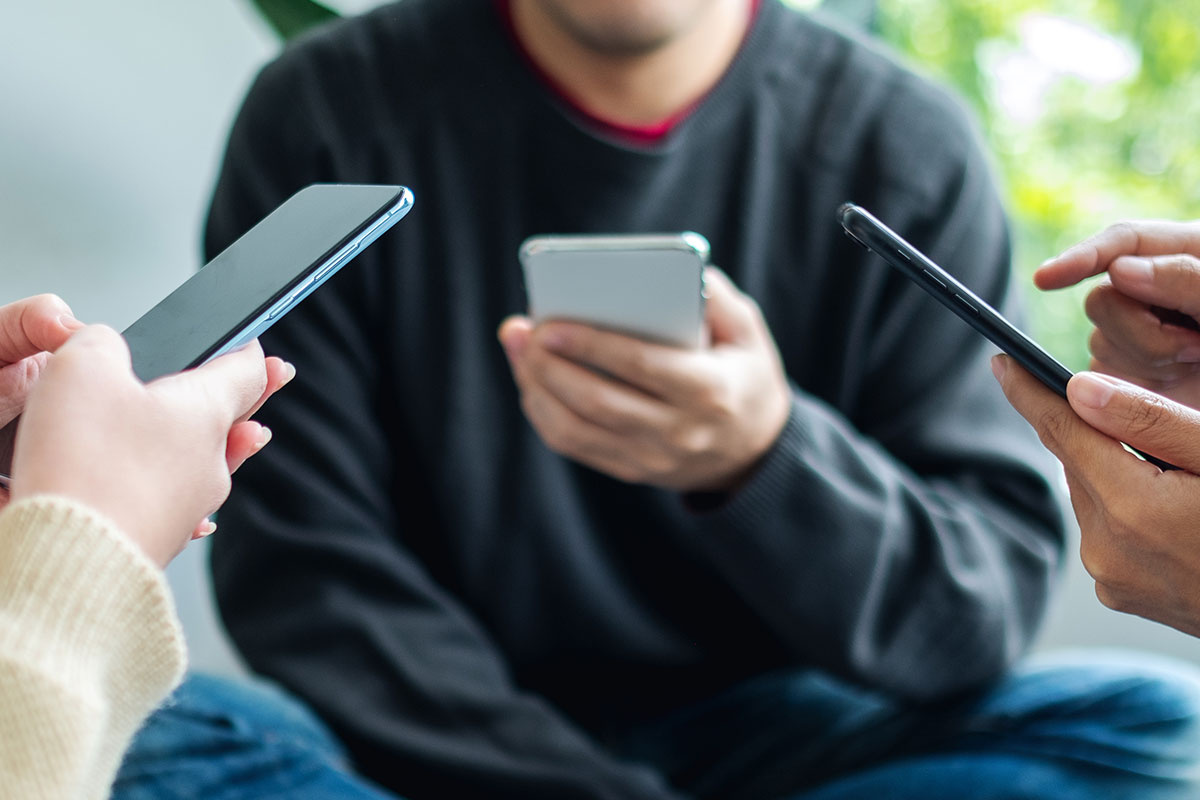 Social Media people on their phones